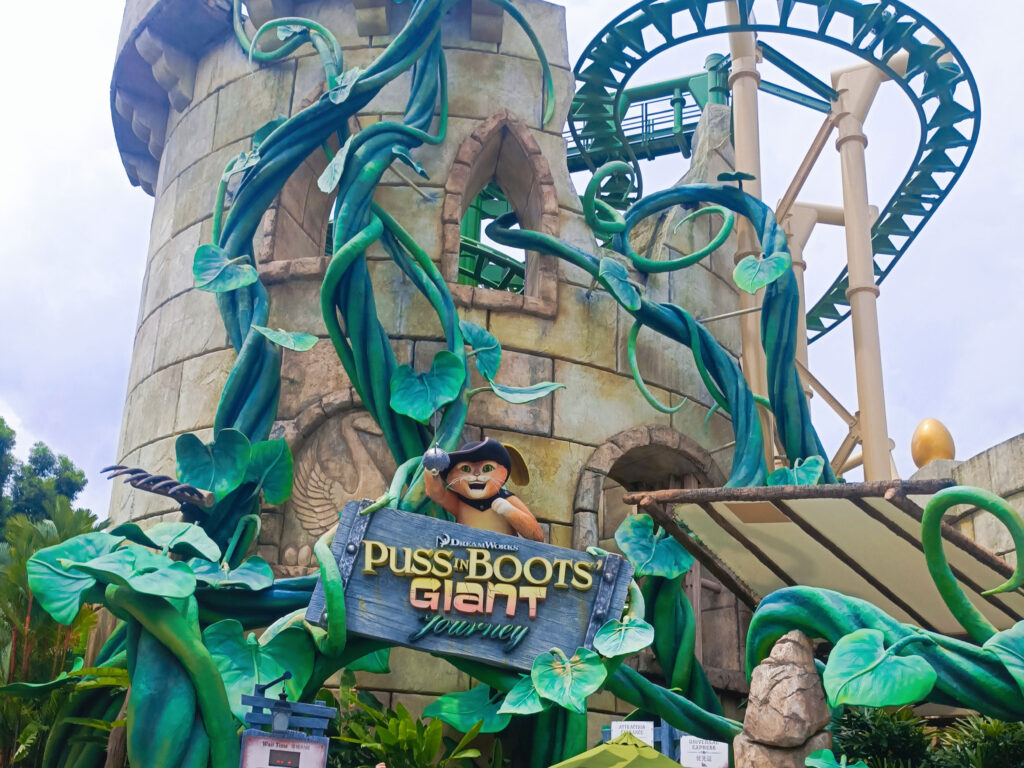 Puss In Boots' Giant Journey roller coaster and entrance sign